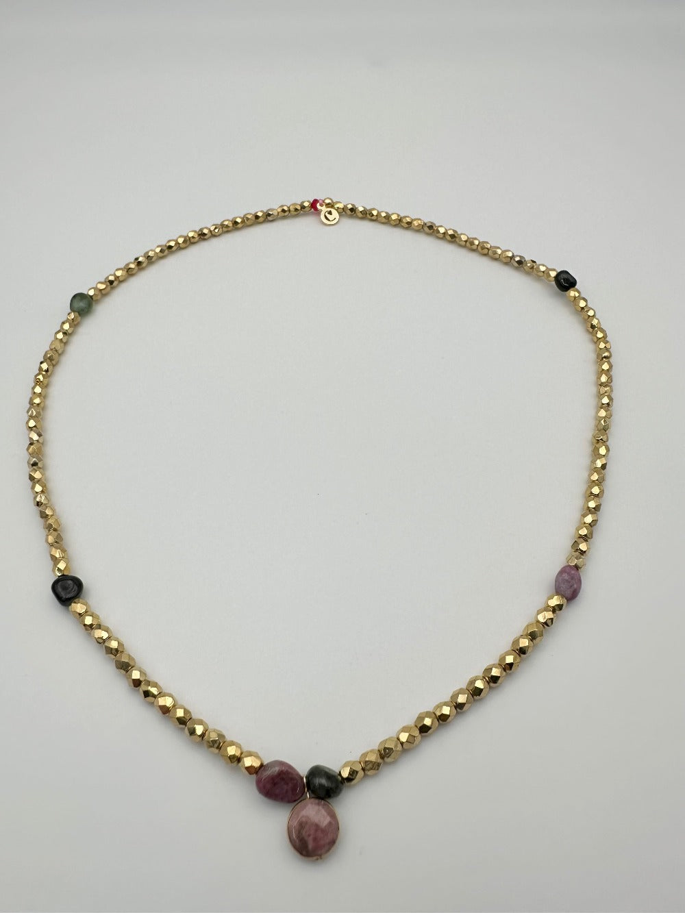 Mi CaJouX de oro de 24 quilates y turmalina