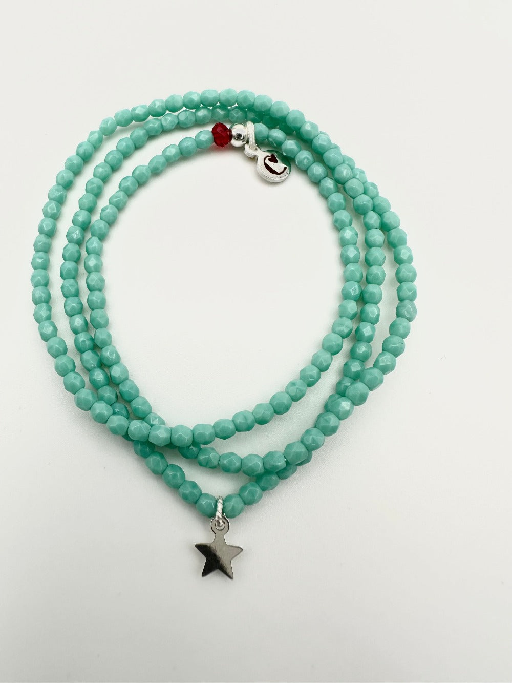 Mon Cajoux 2 en 1 en facettes de bohèmes turquoise et ça petite breloque étoile en argent massif