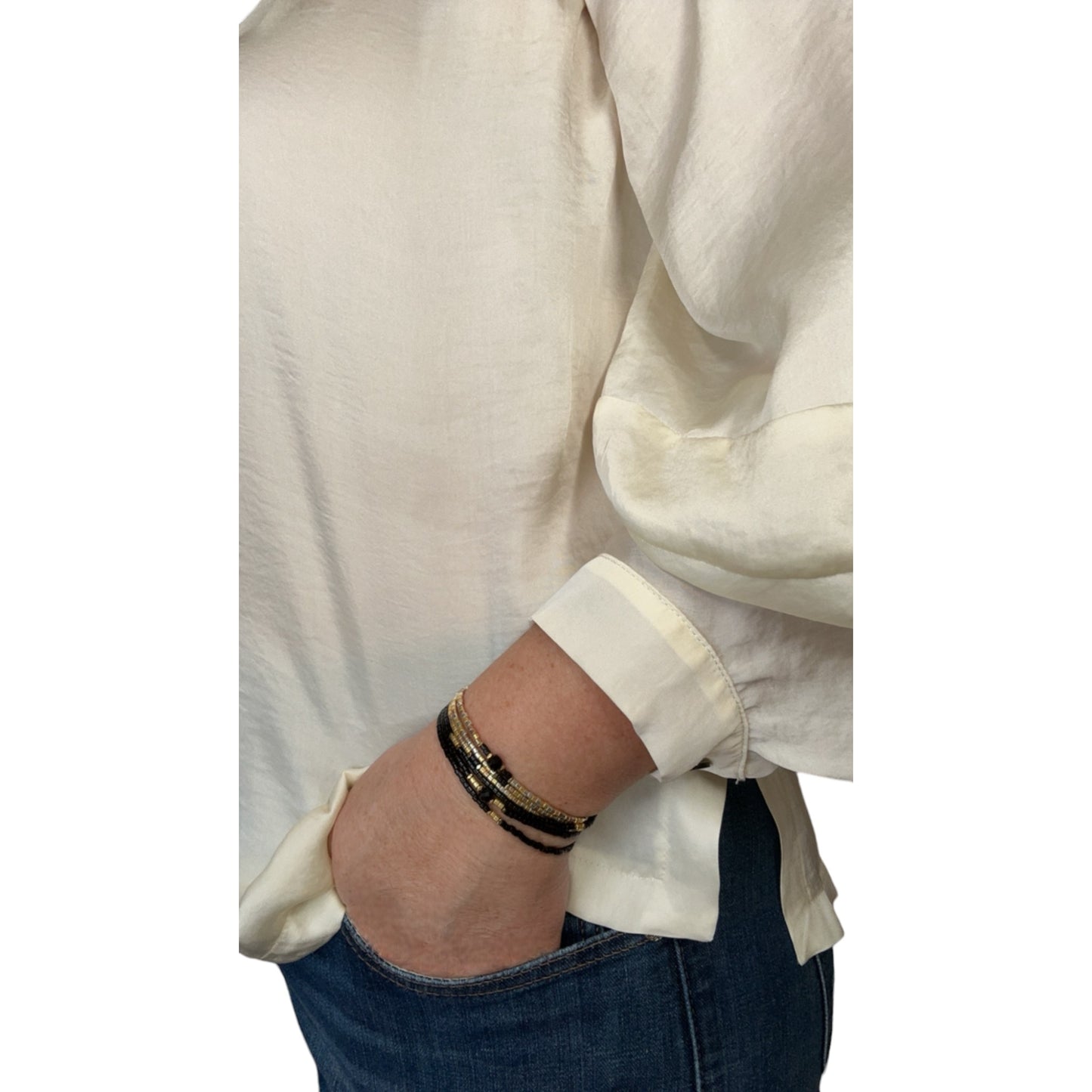 mon cajoux miyuki noir et or et ca perle onyx en 3 rangs de 48 cm soit en collier ou bracelet