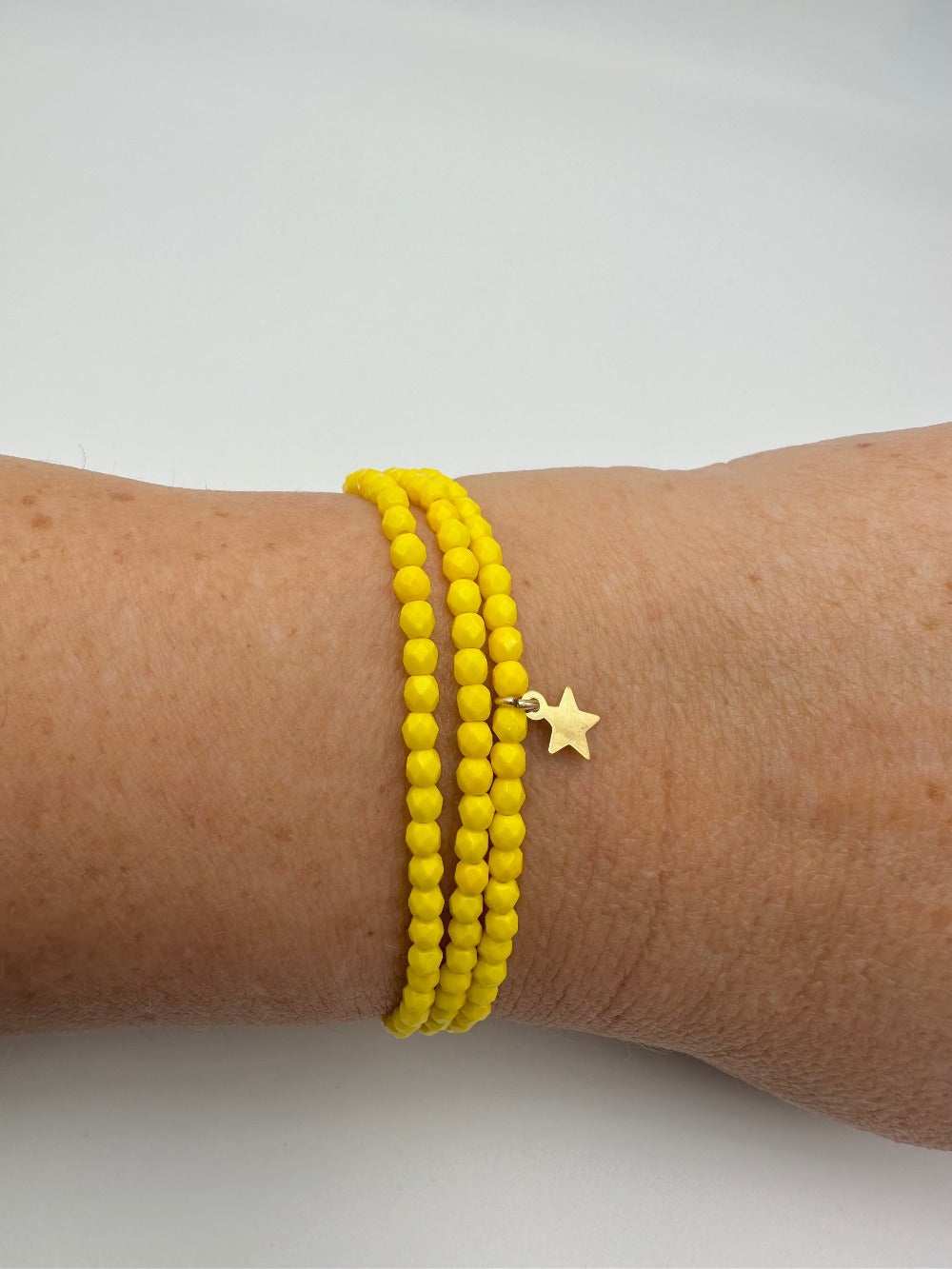 Mon Cajoux 2 en 1 en facettes de bohèmes jaune et ça petite breloque étoile doré à l’or fin
