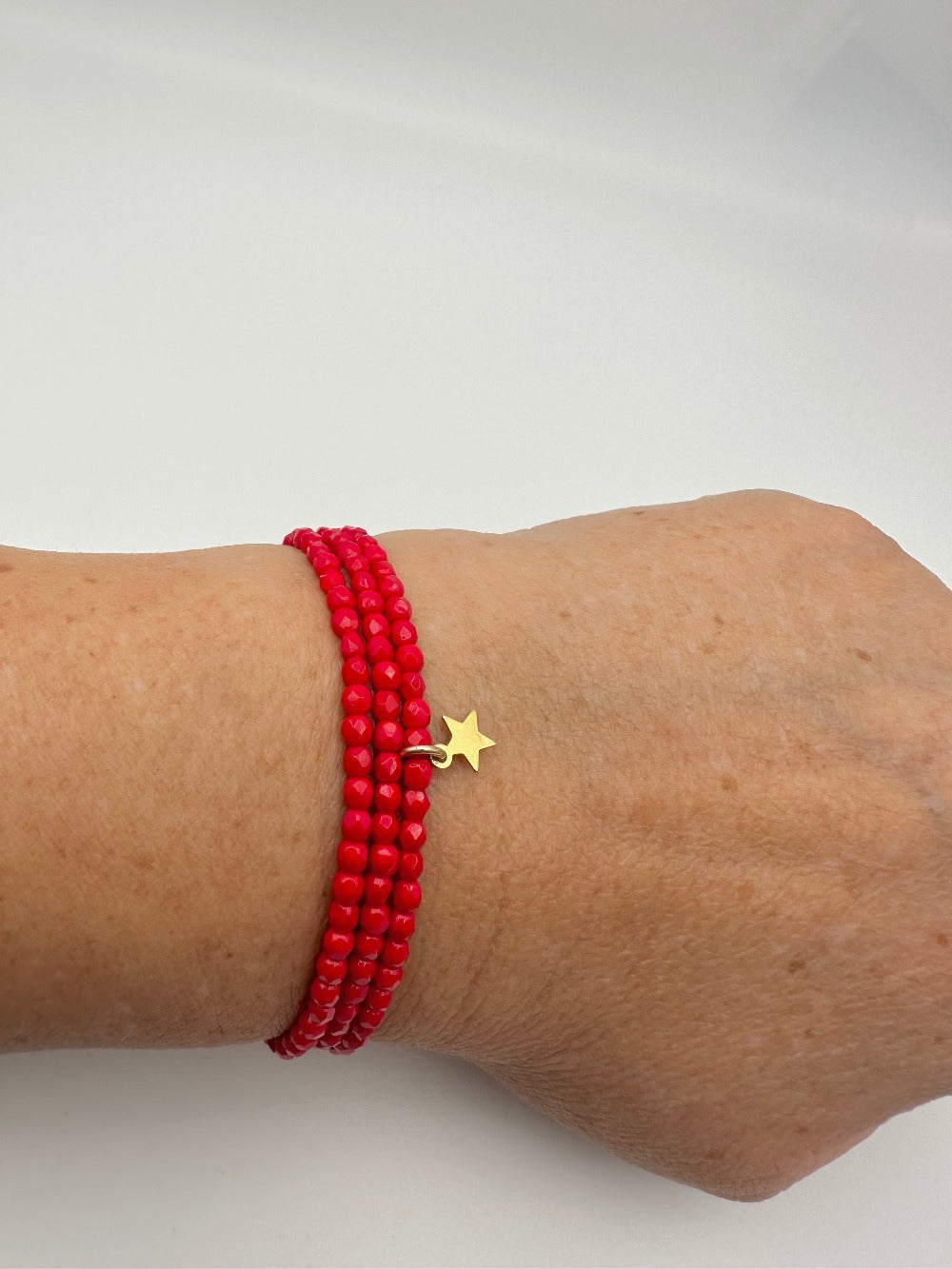 Mon Cajoux 2 en 1 en facettes de bohèmes Rouge et ça petite breloque étoile doré à l’or fin